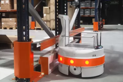 The Autonomous Mobile Robot (AMR) TIAGo Base at the docking station where the robot charges automatically