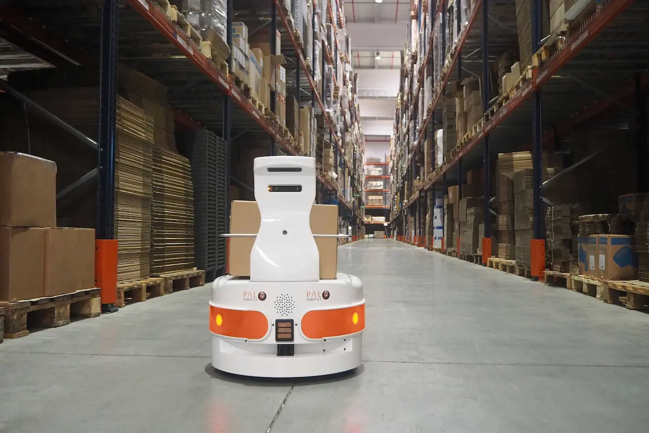 TIAGo Base, the AMR robot in a warehouse