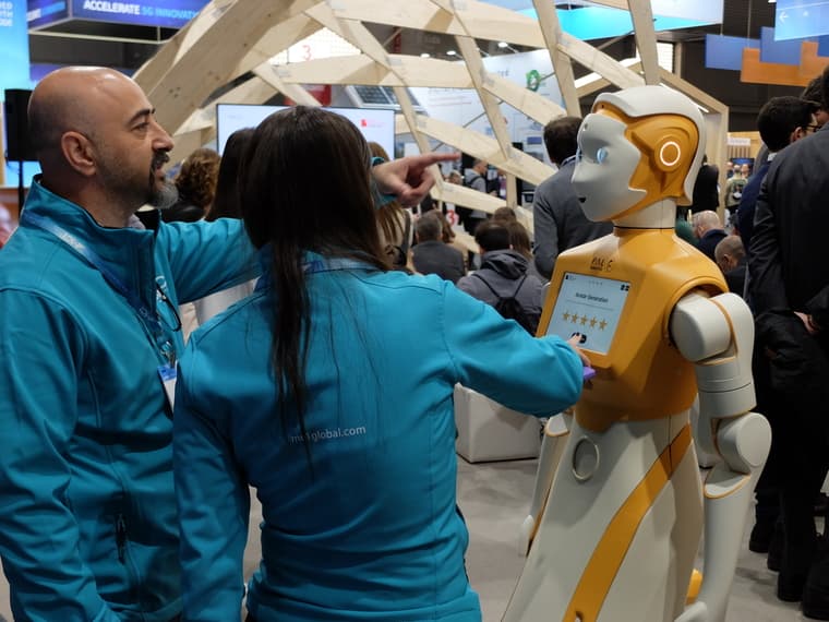 The humanoid social robot ARI at the Mobile World Congress (MWC) 2023 interacting with people
