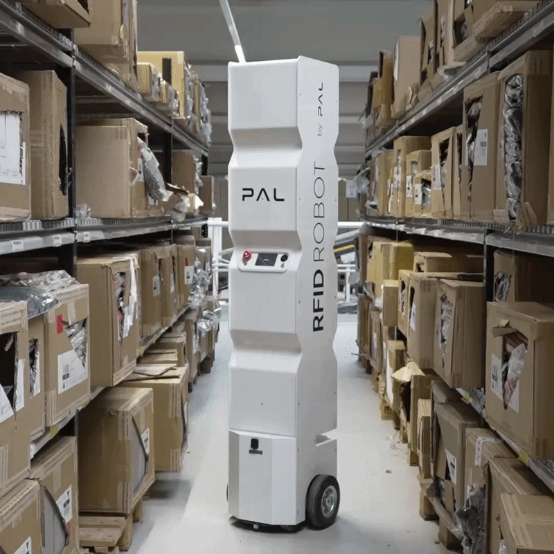StockBot scanning a warehouse with boxes on shelves