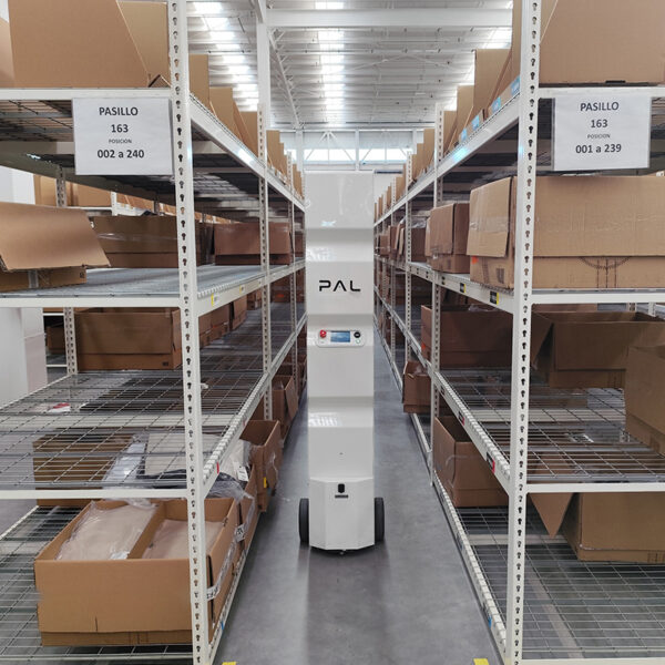 Stockbot in a distribution centre scanning big boxes on shelves